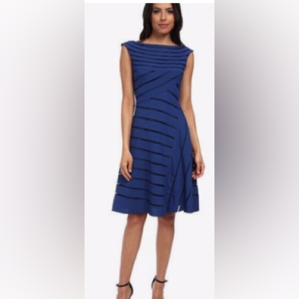 Adrianna Papell Directional splice net dress
Striped Blue Midi Dress